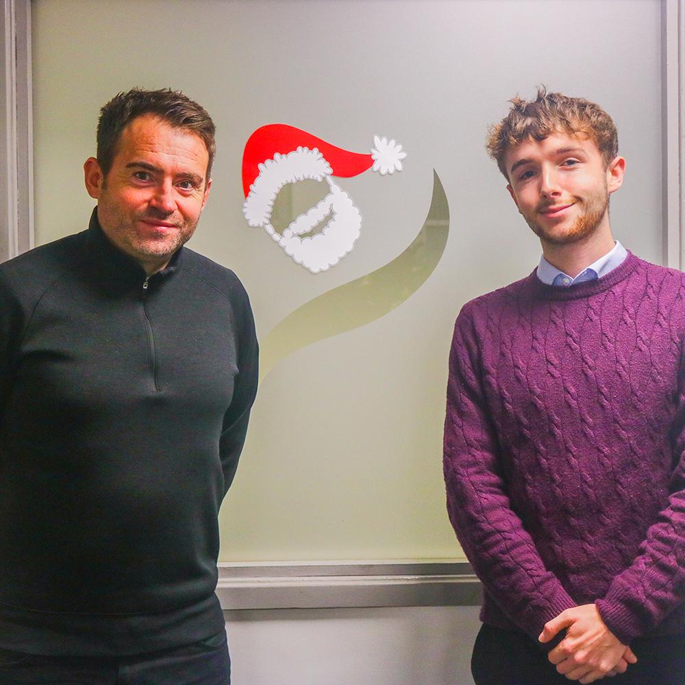 Photo of Digital Marketing Apprentice, Toby, with his manager Chris