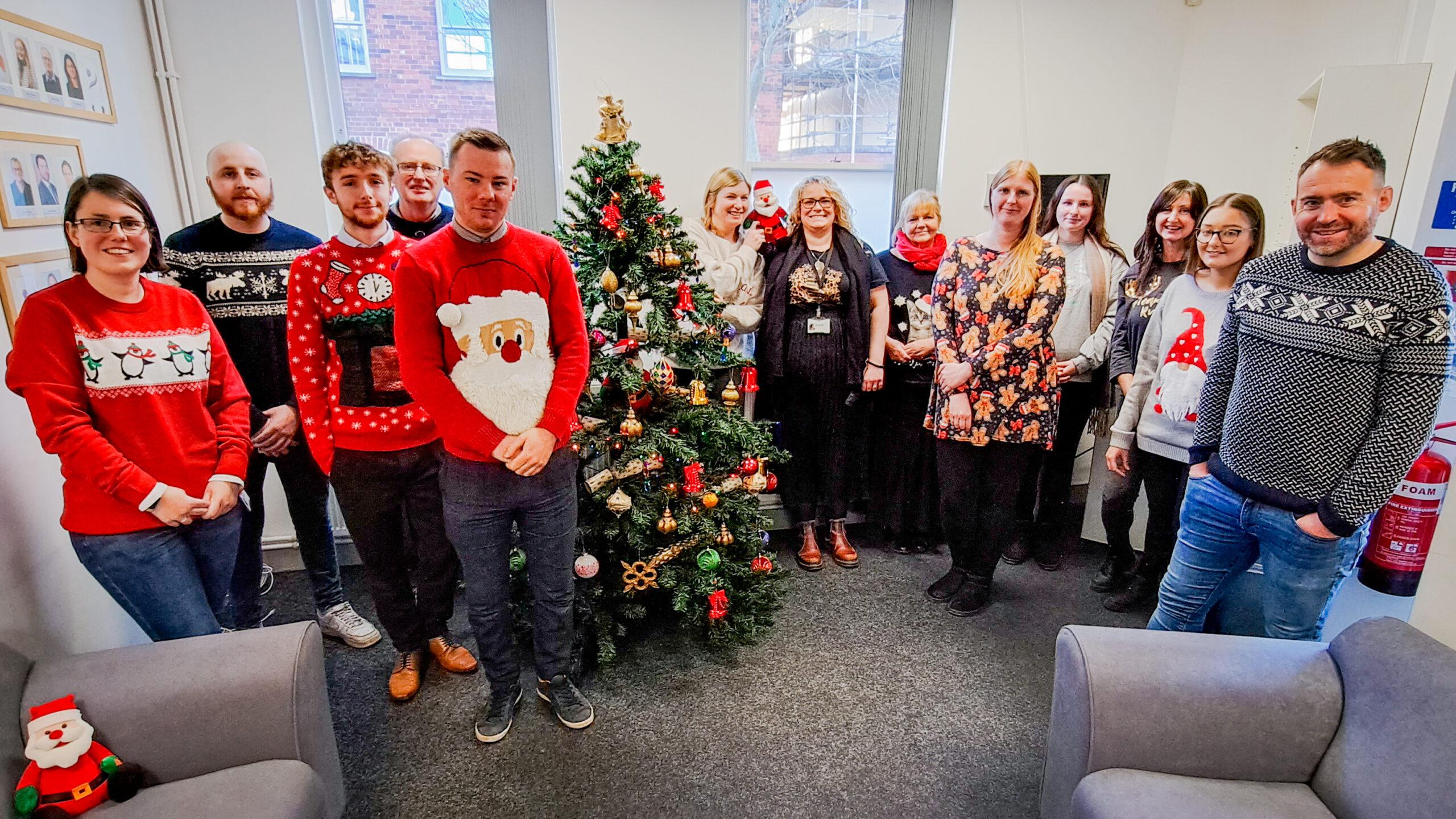 HBTC Team wearing christmas jumpers for christmas jumper day