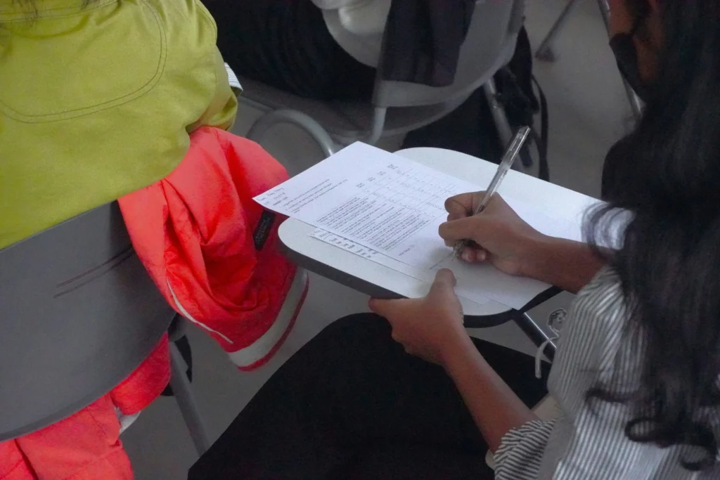 Photo of someone sitting an exam: Staying Mentally Strong During Exam Season: A Guide to Avoiding Stress, Anxiety & Burnout