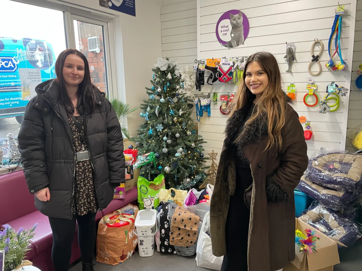 Mya (left), Emily (right), donating our HBTC collection to RSPCA Hull.