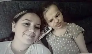 Evie (left), her sister Poppy (right). Evie has completed her Walk for Autism to raise money for Autism Initiatives Group.